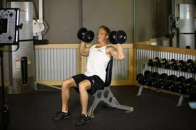 Overhead dumbbell press demonstration